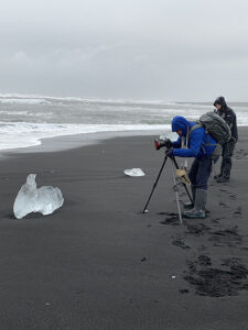 Photographing icebergs on the beach in Iceland